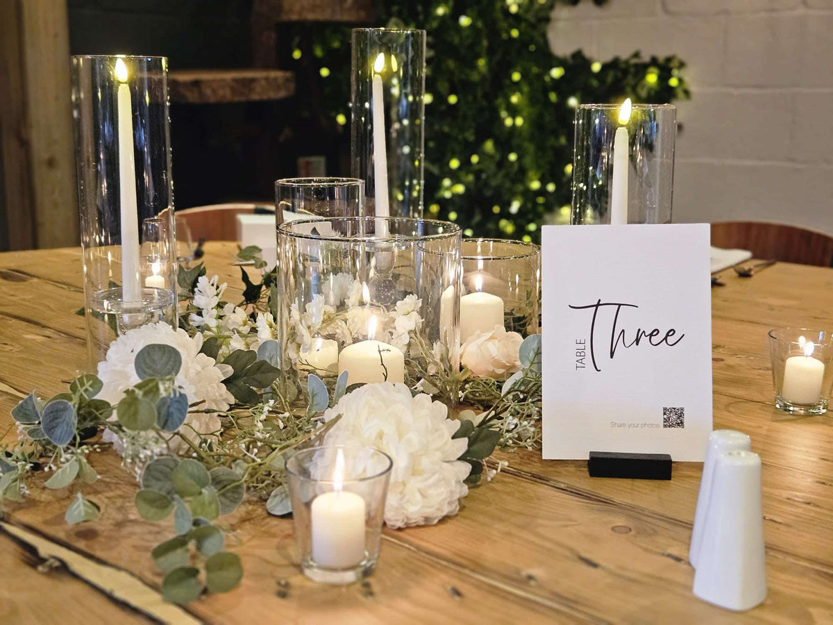 Personalised wedding table number stationery styled with candles and flowers by JJ Bespoke Print